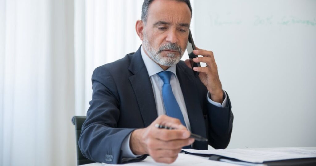 Man on phone call talking about site selection